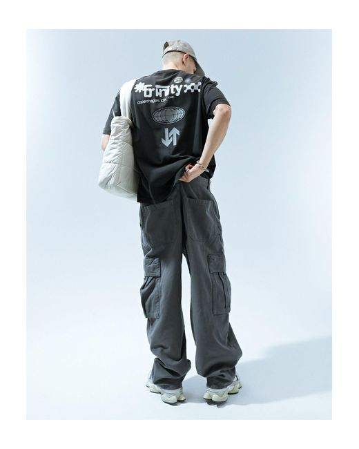 Camiseta negro lavado extragrande con estampado en la espalda ASOS de hombre de color Black