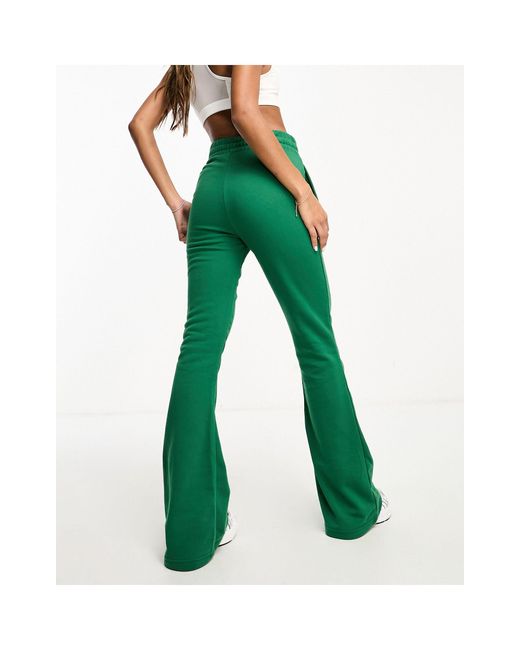 Sage Green Cord Flare Trouser | Trousers | Green jeans outfit, Flared pants  outfit, Green trousers outfit