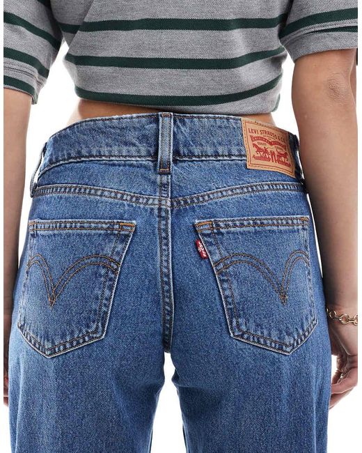 Jeans Ampi Lavaggio Medio Con Vita Super Bassa di Levi's in Blue