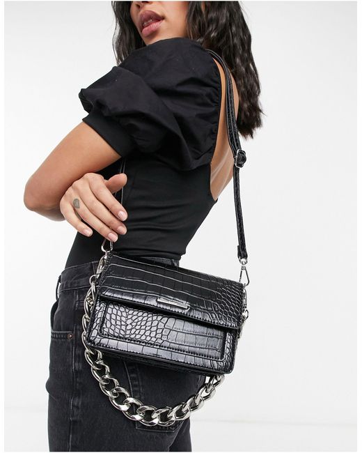 Sac bandoulière effet croco avec chaîne chunky Bershka en coloris Noir |  Lyst