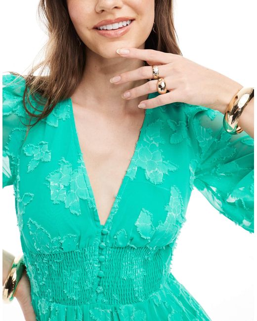 Robe courte plissée et boutonnée à taille froncée et effet dévoré ASOS en coloris Green