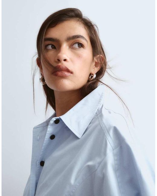 ARRANGE Blue Structured Collared Peplum Shirt With Contrast Buttons