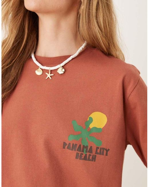 ASOS Orange Oversized Tee With Abstract Holiday Graphic