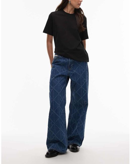 Calvin Klein Blue Laser Cut Repeat Logo Low Rise baggy Jeans