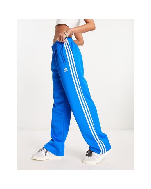Adicolor - pantaloni sportivi scuro di Adidas Originals in Blue