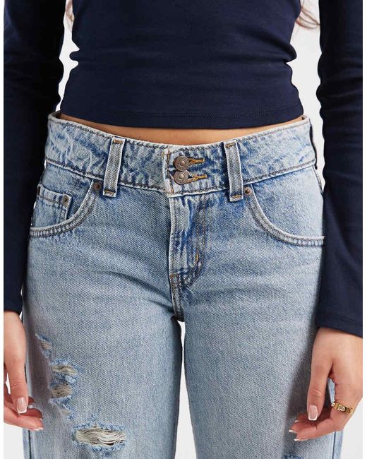 Levi's Blue Superlow Loose Jeans With Rips