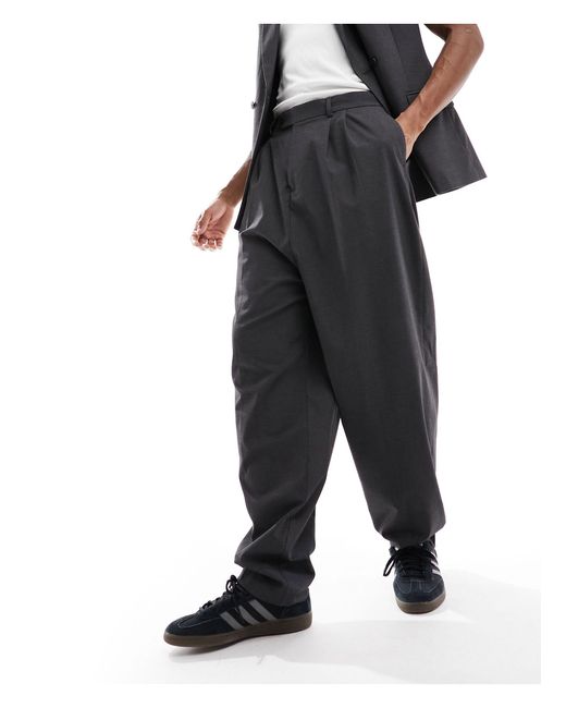 Pantaloni da abito a palloncino eleganti color antracite con pieghe frontali di ASOS in Black da Uomo