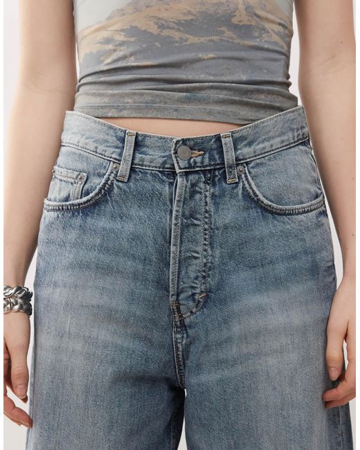 Astro - jean baggy unisexe à taille basse - délavé effet usé Weekday en coloris Blue