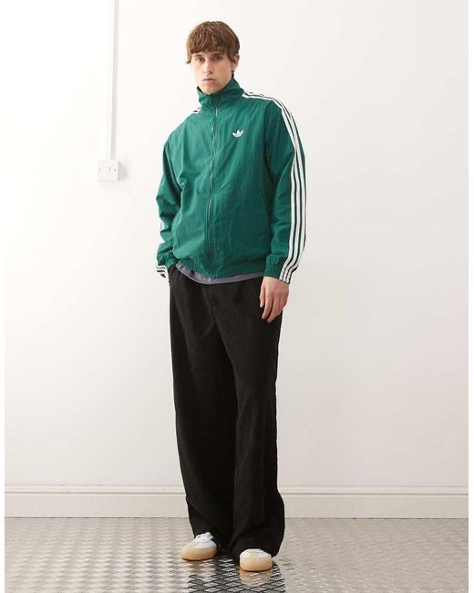 Adidas Originals Green Firebird Woven Track Top for men