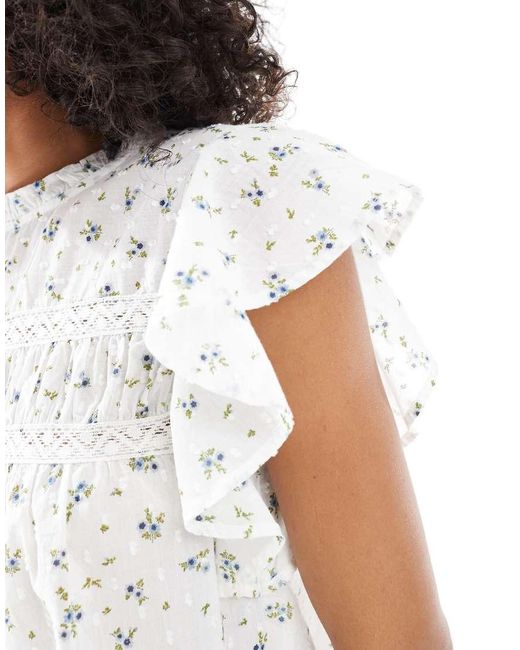 Vero Moda White High Neck Flutter Sleeved Embroidered Top