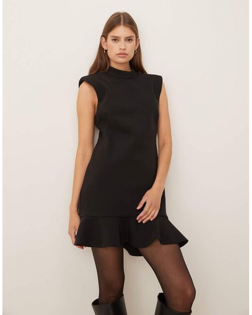 Mango Hoogsluitende Mouwloze Mini-Jurk Met Structuur En Peplumzoom in het Black