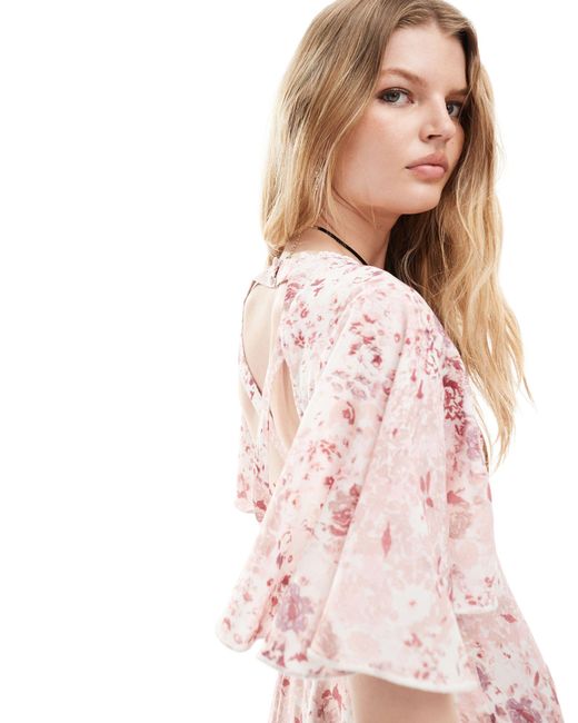 Robe courte à fleurs avec lien noué à l'avant Reclaimed (vintage) en coloris Pink