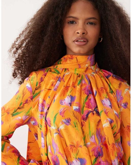 Iyal Orange High Neck Balloon Sleeve Tie Waist Maxi Dress