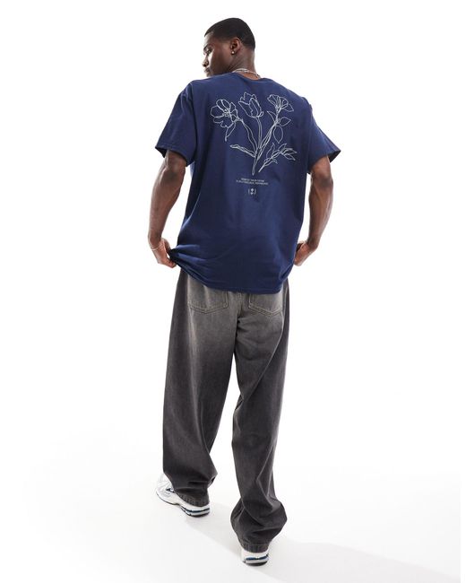 T-shirt oversize à imprimé fleurs au dos ASOS pour homme en coloris Blue