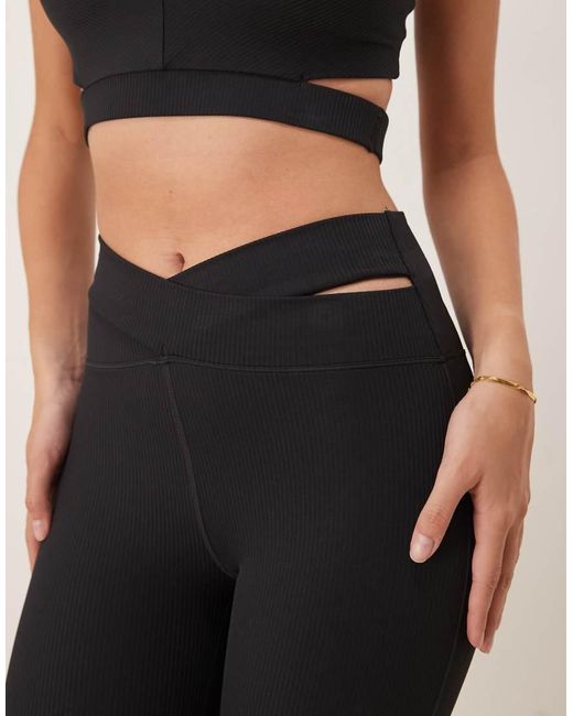 Pantalones De Campana Negros De Talle Alto Con Abertura De Canalé Dri-Fit Zenvy De Nike de color Blue