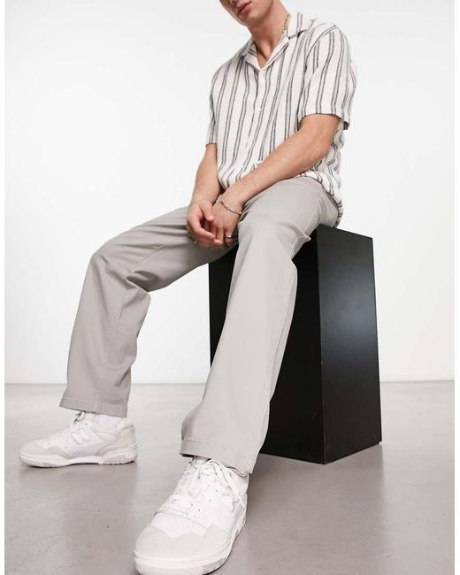 ADPT White Wide Fit Chinos for men