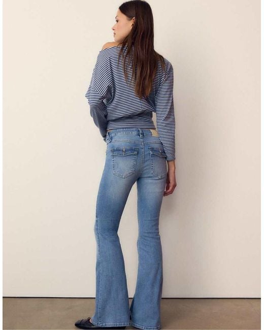 T-Shirt A Maniche Lunghe Con Scollo A Barchetta E Fusciacca A Righe di Stradivarius in Blue