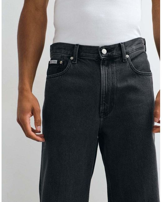 Calvin Klein Black Essential Relaxed Wide Leg Jeans for men