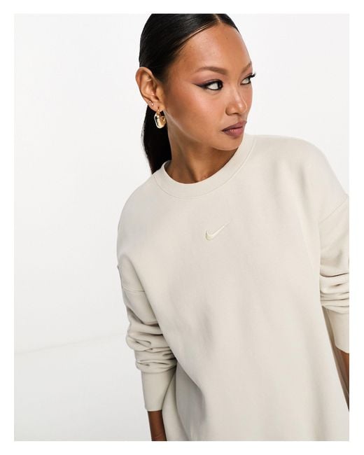 nike mini swoosh oversized boxy light beige sweatshirt