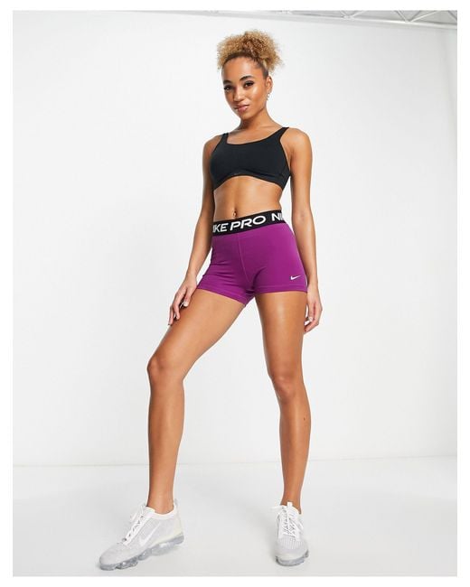 purple nike spandex shorts