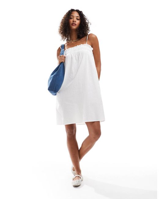 Pieces Blue – gesmoktes, luftiges mini-trägerkleid