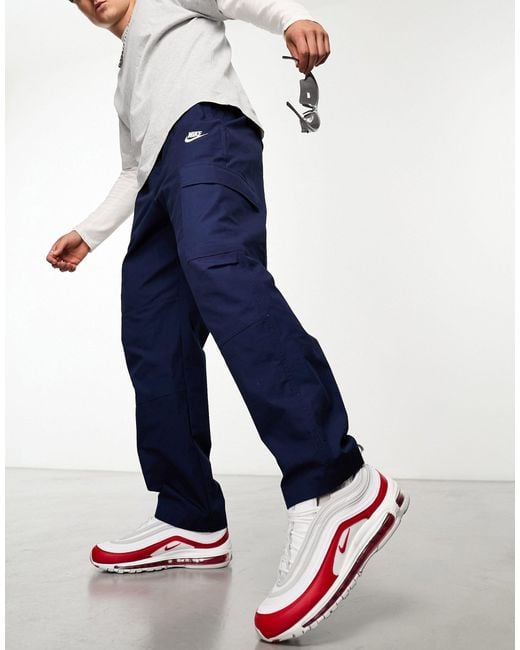Pantalones cargo club Nike de hombre de color Blue