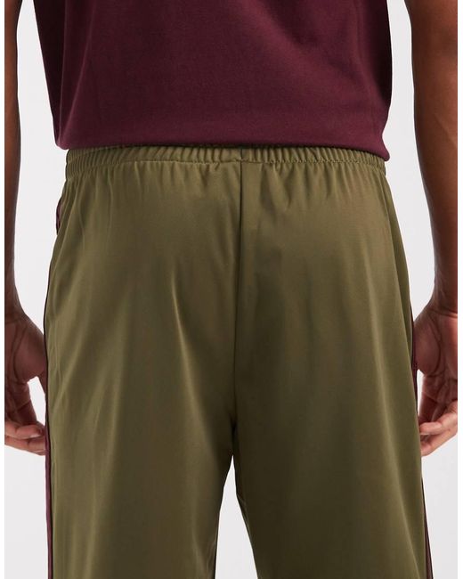 Adidas Originals Purple Firebird Track Pants for men