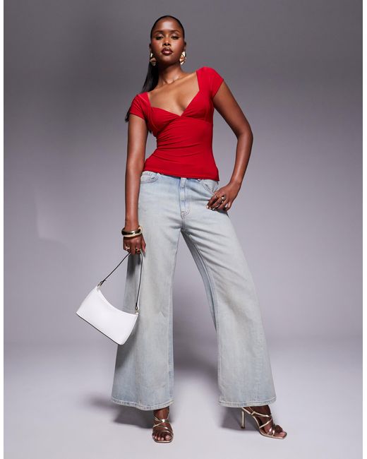 Top près du corps double épaisseur à mancherons et dos nu avec détail noué Fashionkilla en coloris Red