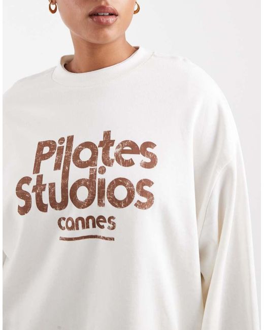 ASOS White Asos Design Curve Oversized Sweatshirt With Pilates Studio Graphic