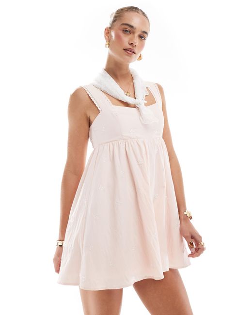 The Frolic Pink Exclusive Cotton Square Neck Lace Trim Bow Embroidered Tie Back Floaty Playsuit