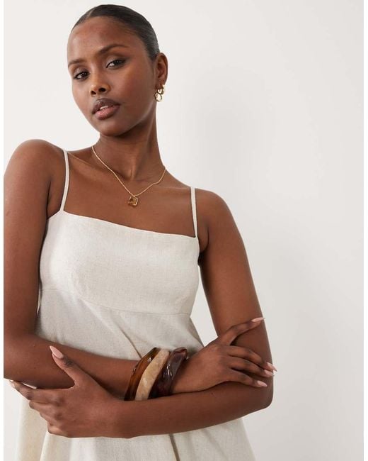 The Frolic White Exclusive Linen Look Square Neck Cinched Open Back Detail Floaty Mini Dress