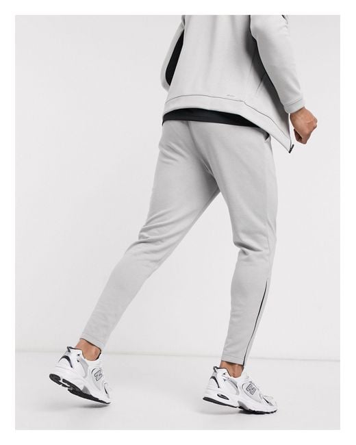 new balance tenacity poly track pants