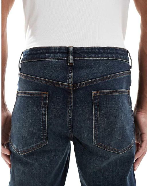 Vaqueros De Corte Slim Con Lavado Azul Oscuro Tintado De ASOS de hombre de color Blue