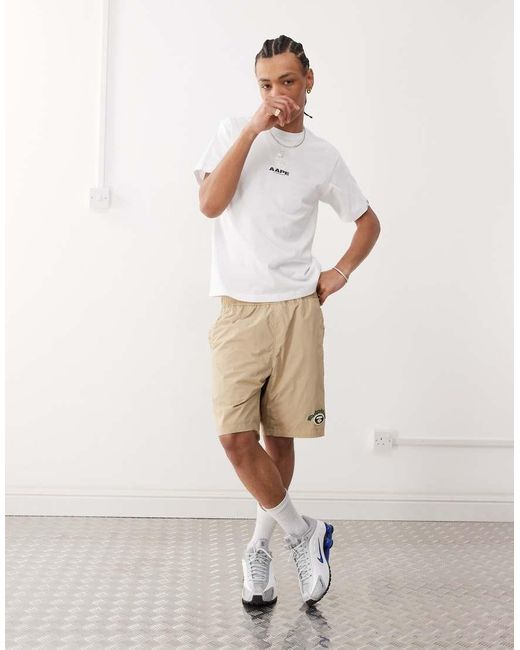 Camiseta Blanca Con Logo Estampado En La Espalda De Aape By A Bathing Ape de hombre de color White