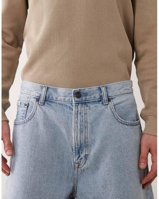 Calvin Klein Natural Long Relaxed Fit Denim Shorts for men