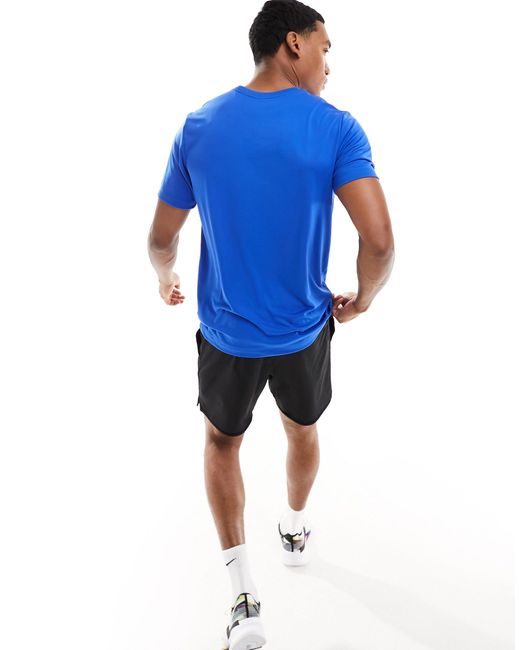 T-shirt à imprimé graphique - roi Nike pour homme en coloris Blue