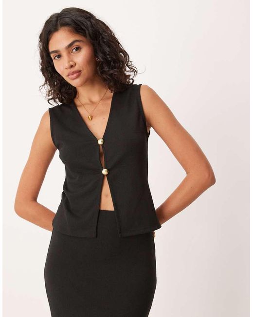 Top Senza Maniche Con Scollo A V E Bottoni di ASOS in Black