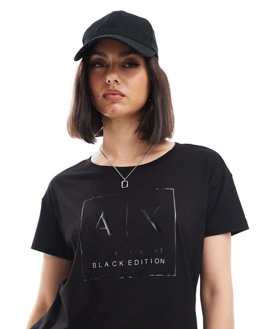 Camiseta negra brillante hotsell