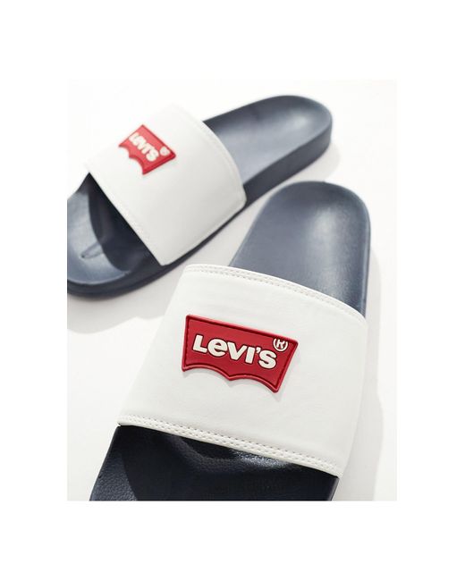 Sliders bianche/blu navy con logo batwing di Levi's in White da Uomo