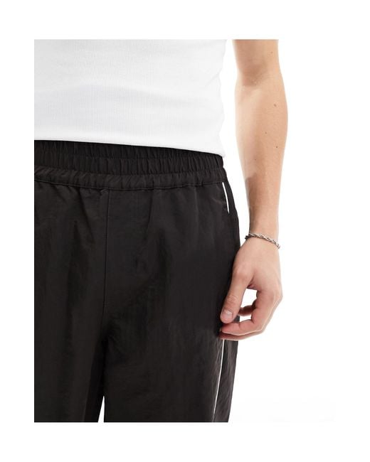 ASOS Black baggy Nylon Track Pants for men