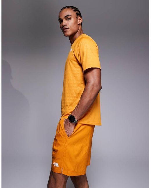 The North Face Orange Pentadome Embossed 24/7 Logo Short for men