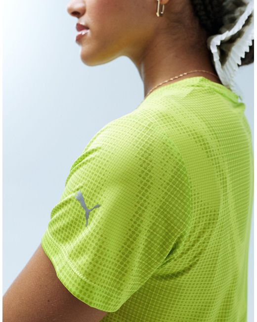 Run favourite - t-shirt giallo lime di PUMA in Green