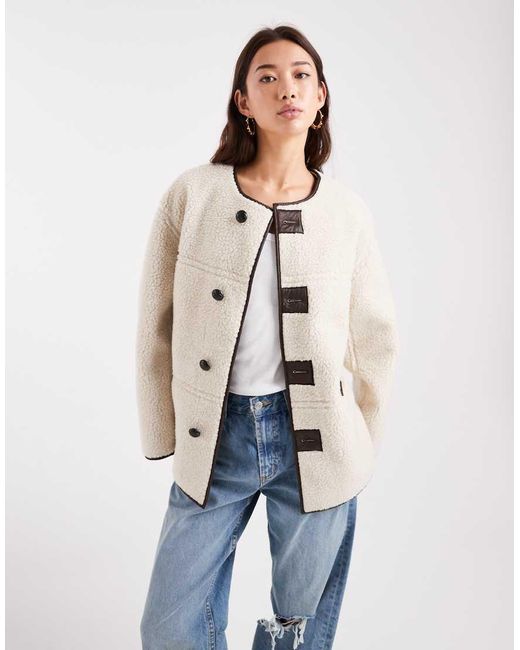 Chaqueta Reversible Color Crema Y Marrón De Cuero Sintético Y Borreguito Tipo Peluche De Pieces de color Blue