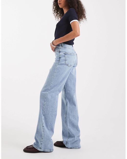 Jean large à taille haute - clair délavé Vero Moda en coloris Blue