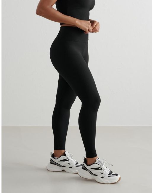 Leggings Tecnici A Coste Neri di Aim'n in Black