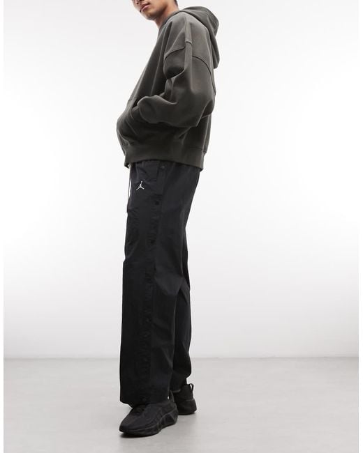 Nike Gray Brookyln Woven Trousers for men