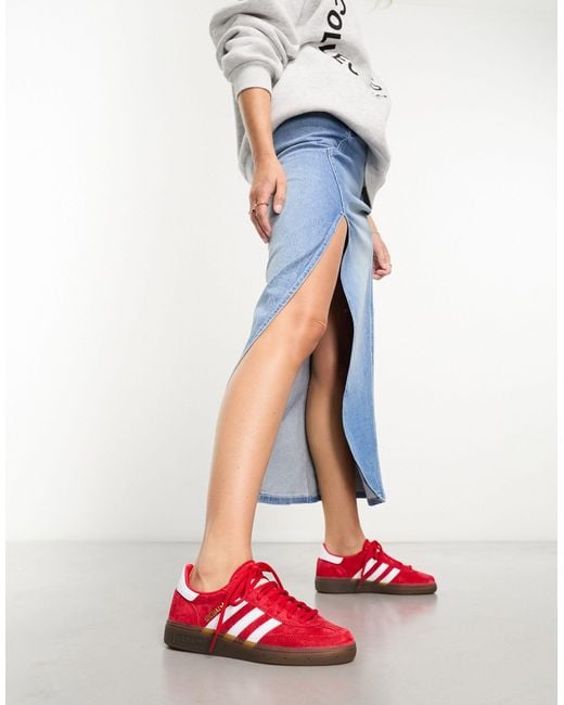 Handball spezial - sneakers rosso scarlatto e bianche con suola di Adidas Originals in White