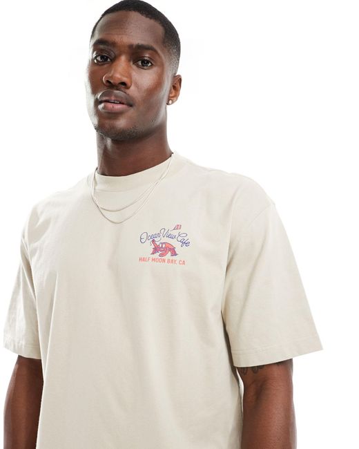 T-shirt coupe carrée avec imprimé ocean view cafe au dos Hollister pour homme en coloris White