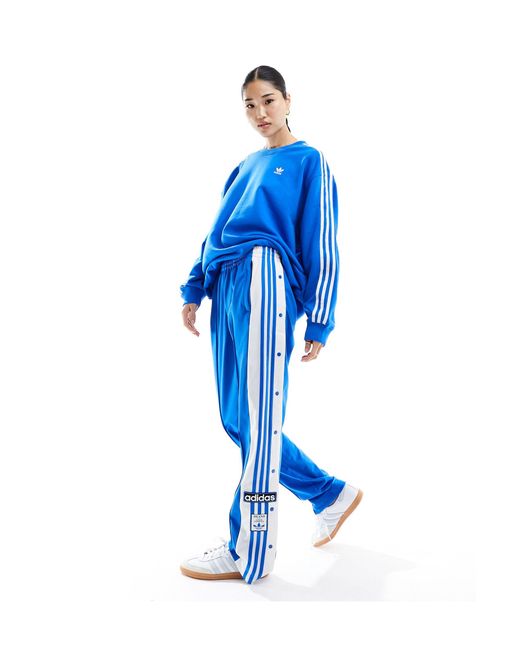 Adibreak - pantalon avec boutons-pression Adidas Originals en coloris Blue