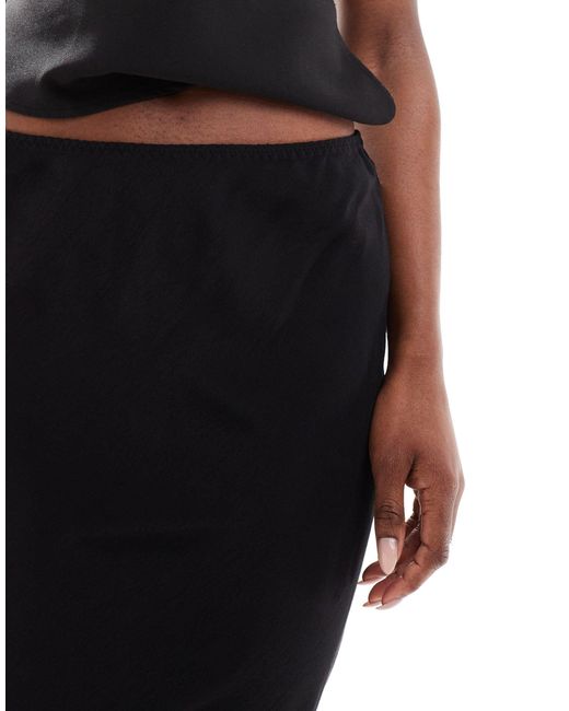 Serena - jupe mi-longue longueur genou Weekday en coloris Black
